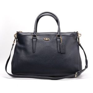 COACH Morgan Pebble Leather Satchel in Dark Blue.